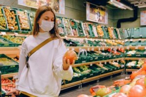 young woman shopping during COVID-19 pandemic