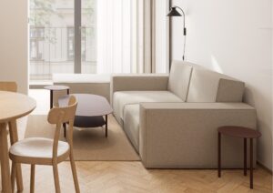 Comfortable sofa with city views in a one-bedroom apartment at Fellows Jaselská, Brno.